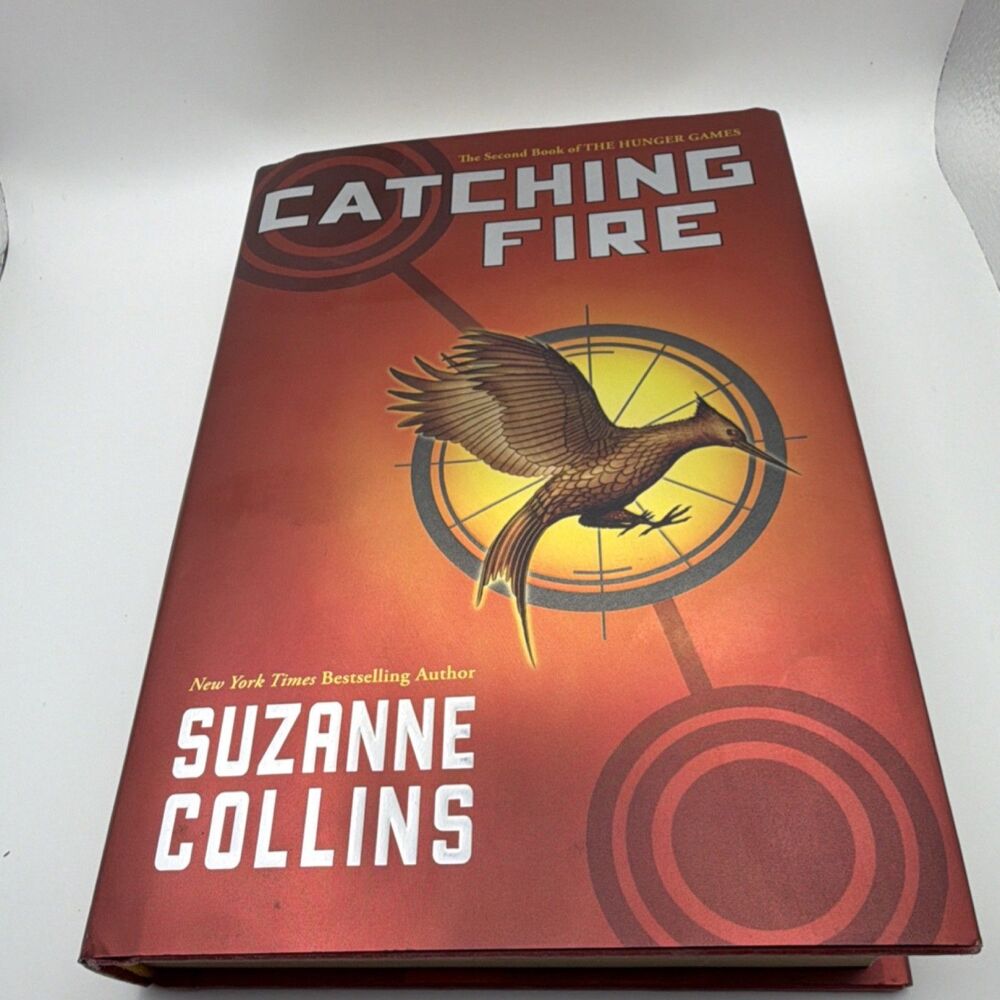 Catching Fire Suzanne Collins Hardcover The Hunger Games Dystopian Fiction 1st e